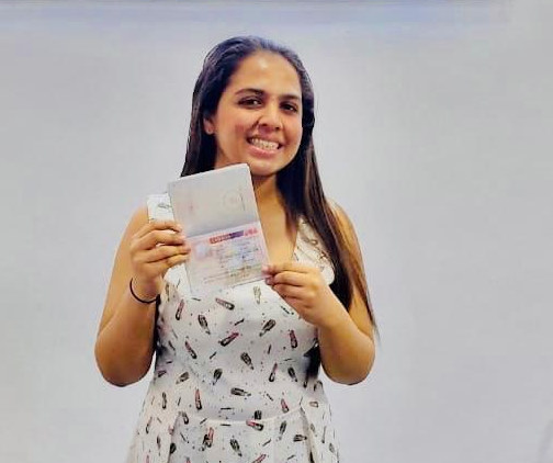 Thihansa holding her Canadian study permit